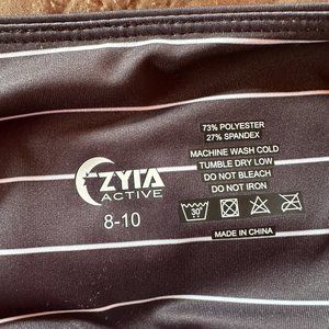 Zyia black stripe pocket light n tight leggings Size 8/10